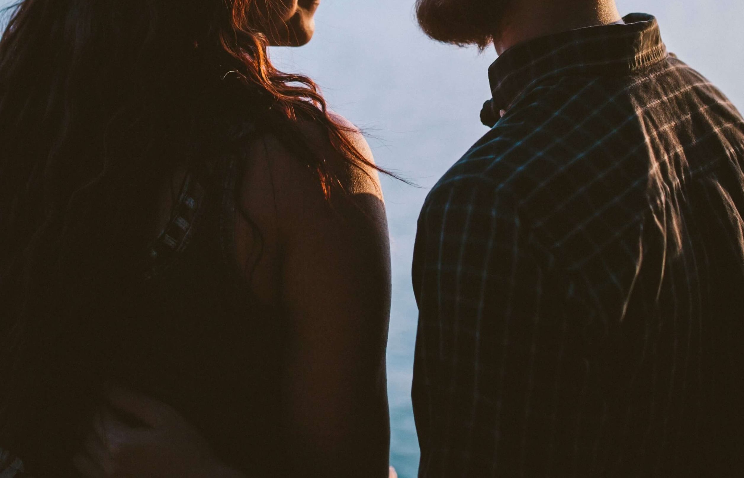 Image of a couple standing together outside. Discover how gaslighting can be affecting your relationship and how trauma therapy in Austin, TX can help.